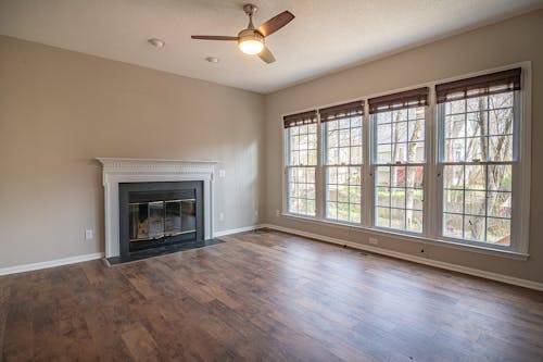 Brown Wooden Framed Glass Window and Fireplace