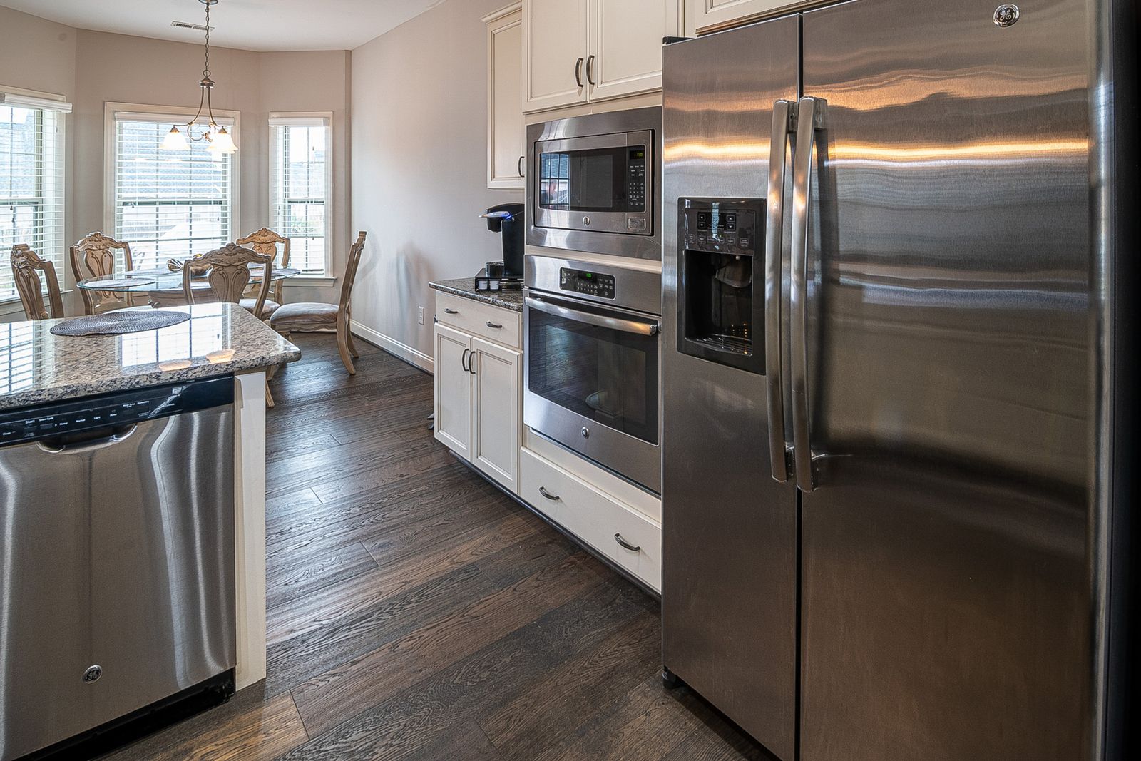 Modern kitchen fitted with stainless steel appliances