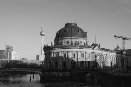 Free Black and white photo of Bode Museum with Fernsehturm in Berlin, Germany. Stock Photo