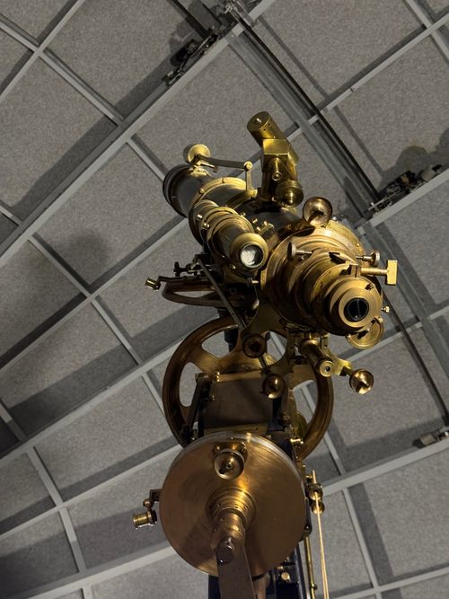 Free Detailed view of an antique brass telescope inside an observatory in Rozzano, Italy. Stock Photo