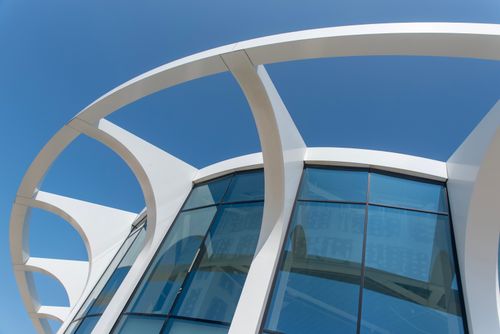 Free A stunning modern structure with unique curves and glass in Den Haag, Netherlands. Stock Photo