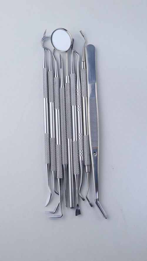 Free Close-up of dental instruments in a clinic setting, perfect for medical and dentistry themes. Stock Photo