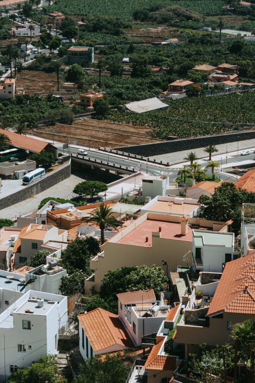 Free Picturesque view of Valle Gran Rey with terracotta roofs and lush greenery. Stock Photo