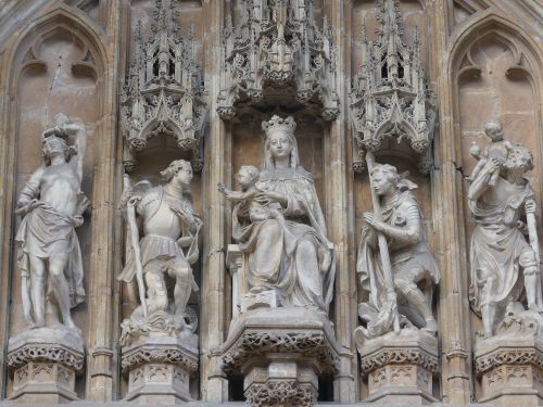 Free Detailed view of ornate statues on a Gothic cathedral facade in Brussels, Belgium. Stock Photo