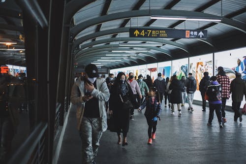 People Walking On Train Station