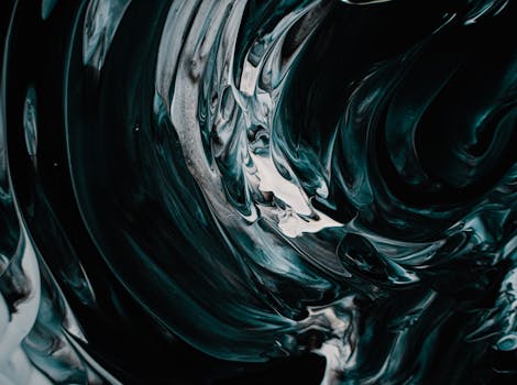 这幅令人惊叹的抽象图像，以艺术手法呈现了旋转的黑色流体设计