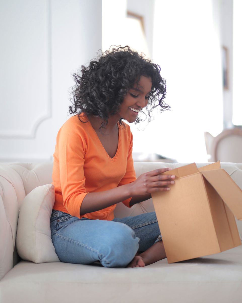 Seller carefully packaging an order for dispatch