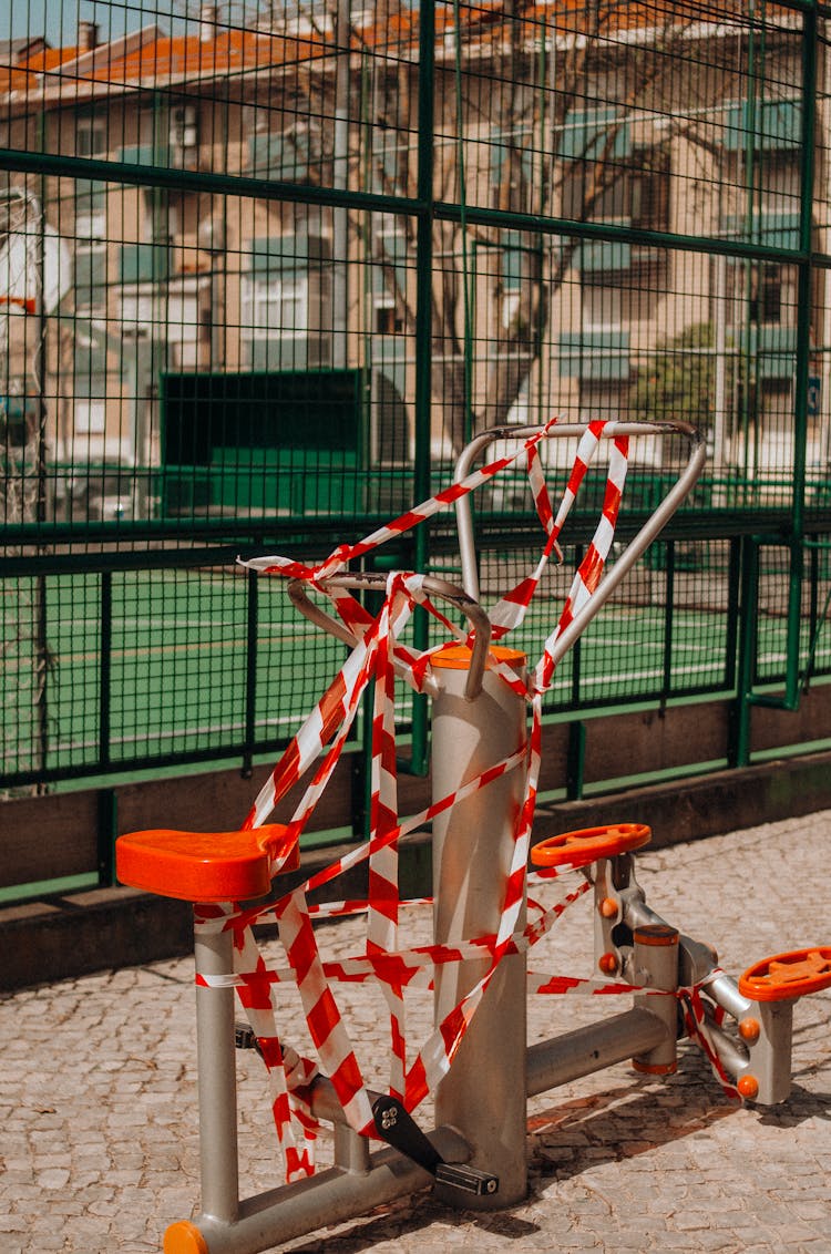 Exercise Equipment Wrapped In Barricade Tape