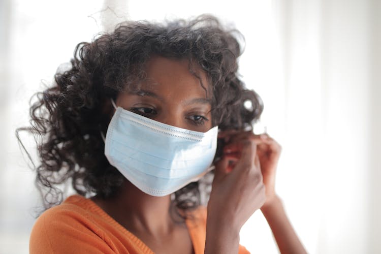 Serious Black Woman Wearing Mask