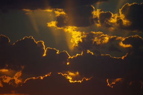 Free Vivid sunset with dramatic clouds in Baku, showcasing golden light and contrasting shadows. Stock Photo