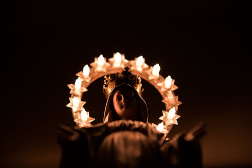 Madonna Statue Holding a Lighted Crown