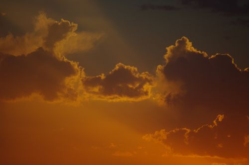 Free Dramatic sunset clouds with vivid colors over Baku, Azerbaijan, creating a stunning sky scene. Stock Photo