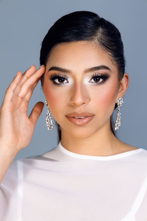 Free Close-up portrait of a woman with glamorous makeup and elegant earrings. Stock Photo