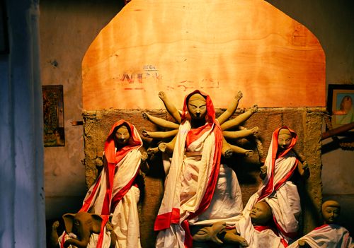 Free Traditional clay idols of Durga being crafted in a Kolkata workshop. Stock Photo