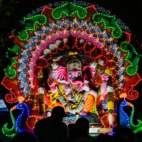 Free Colorful Ganesh Chaturthi festival in Bengaluru, showcasing a beautifully illuminated Ganesha idol. Stock Photo