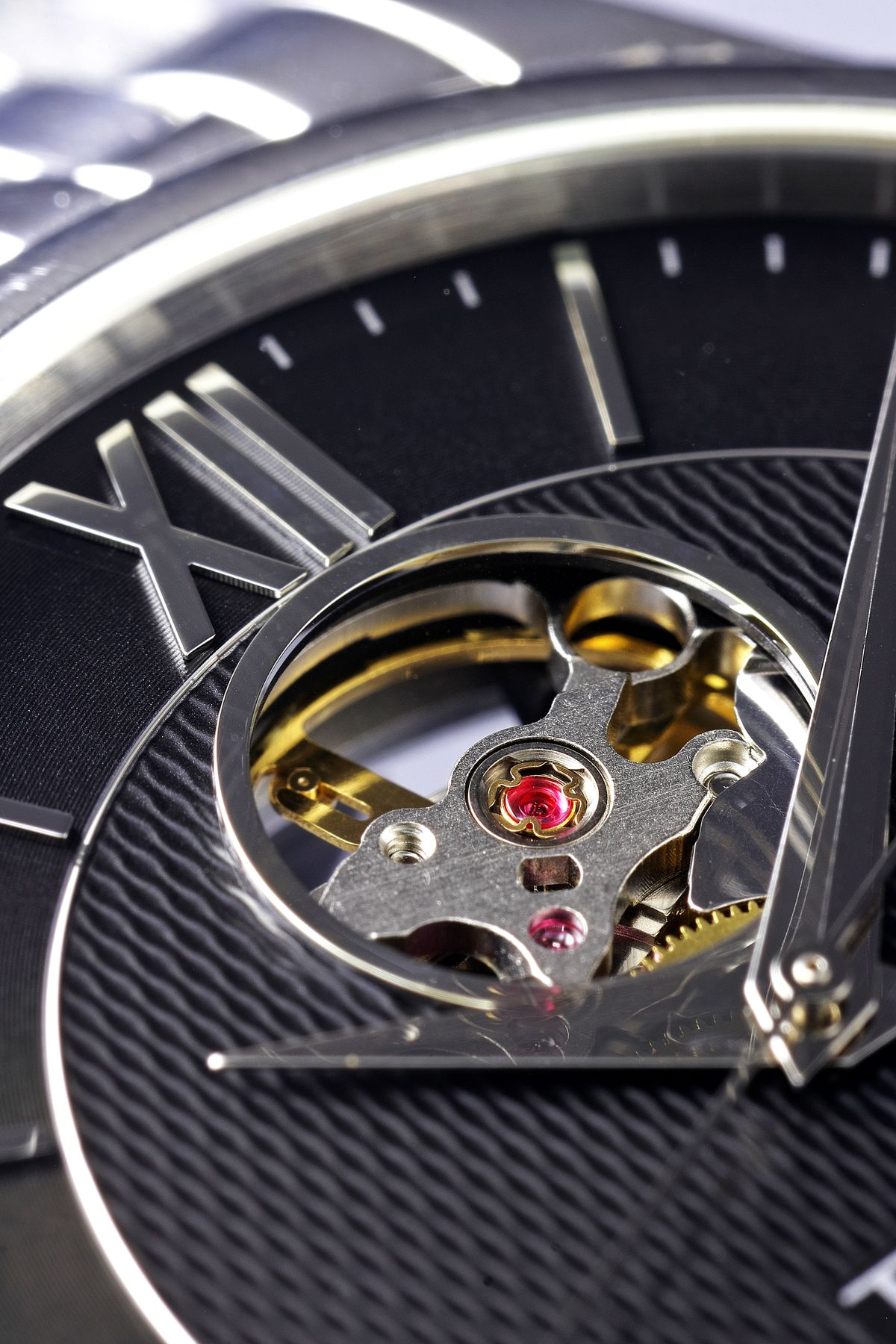 Celestial Grande Complication — openworked dial with Roman numerals and exposed jewelled calibre