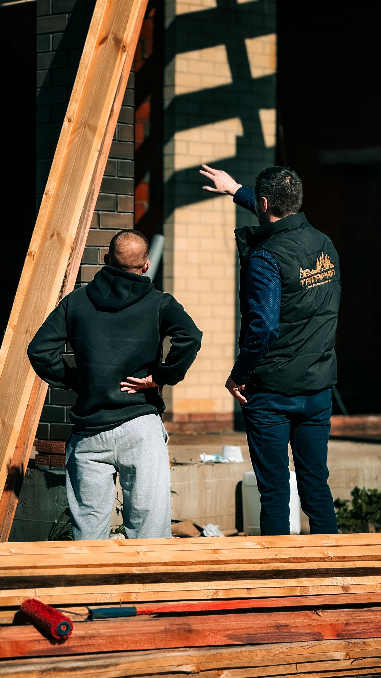 Roofing company owner reviewing financing options on a laptop in his truck