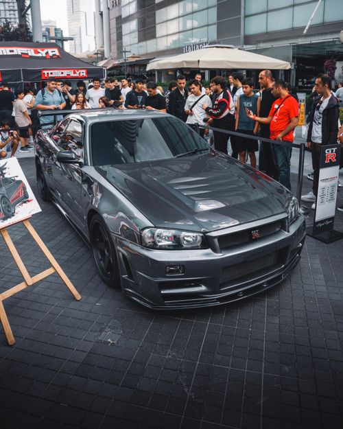 Free High-performance sports car showcased outdoors at a mall event in Ankara, Türkiye, attracting enthusiasts. Stock Photo