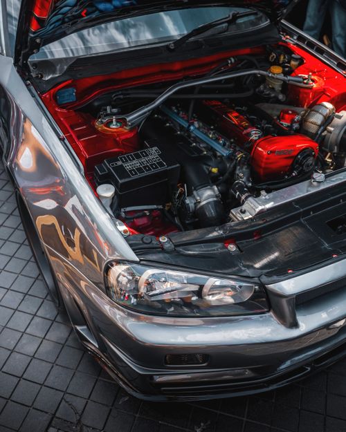 Free Detailed view of a high-performance car engine exposed outdoors in Ankara. Stock Photo