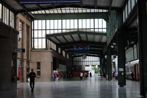 Free Interior view of a train station in Ankara, Turkey with travelers and modern architecture. Stock Photo