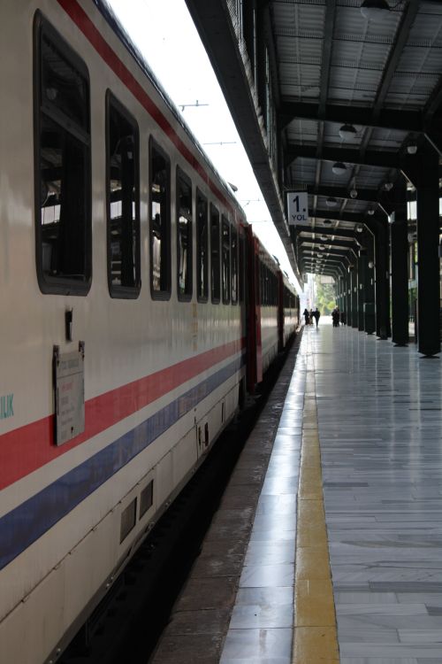 Free A passenger train ready for departure at Ankara's main railway station platform. Stock Photo