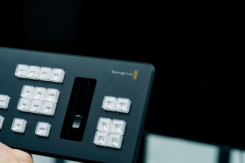 Free Close-up of a professional video production control panel with buttons and slider for editing. Stock Photo