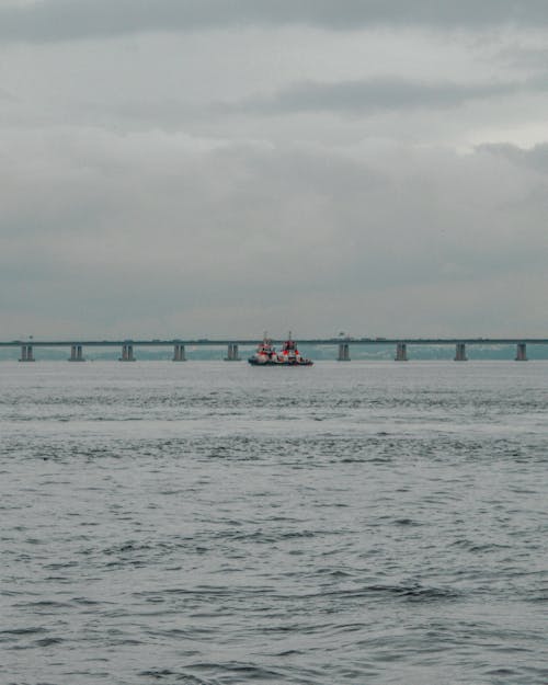 People Riding A Boat