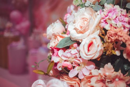 Free Beautiful bouquet of pastel flowers in soft lighting, perfect for romantic and elegant themes. Stock Photo