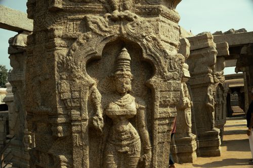 Free Explore the detailed stone carvings of a historic South Indian temple architecture. Stock Photo