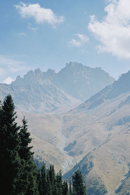 Free Majestic mountains under a clear blue sky in Talgar, Almaty Region, Kazakhstan. Stock Photo