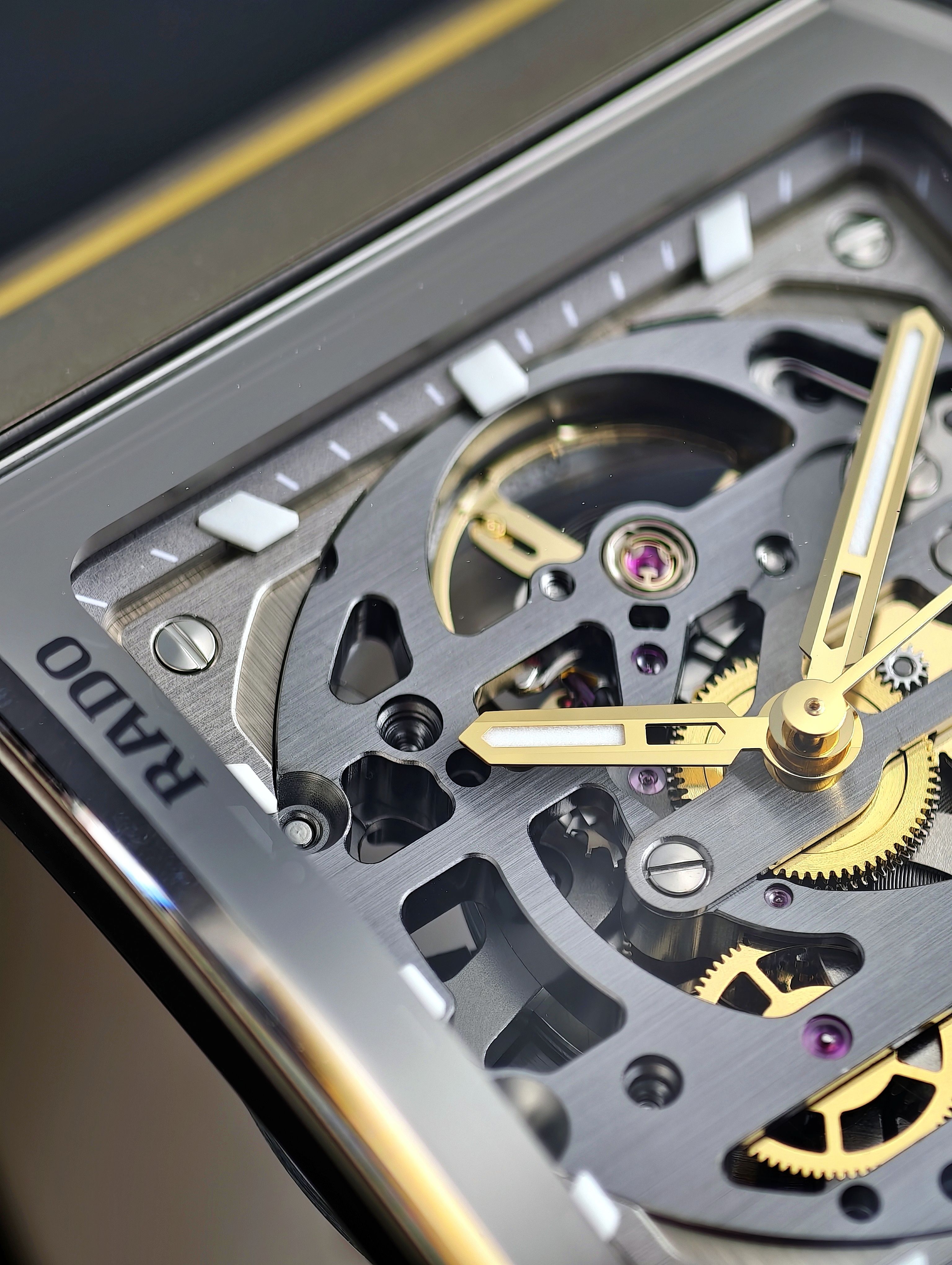 Close-up of a Swiss luxury skeleton watch showcasing intricate gears and design.
