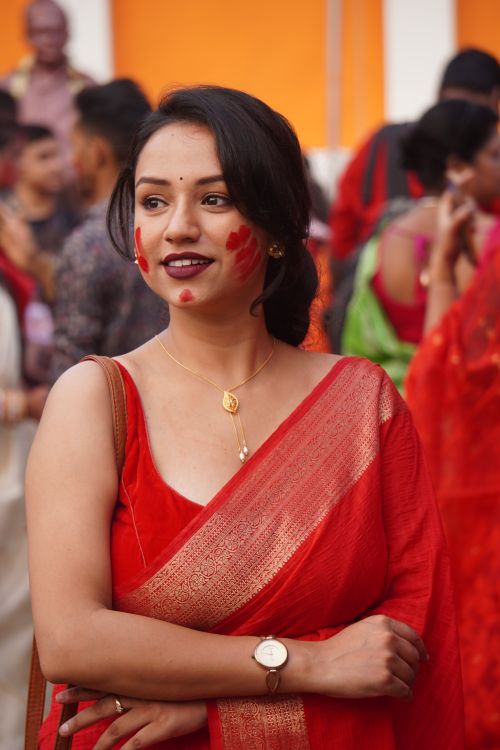 Free Woman in red saree with sindoor during Durga Puja festival celebration. Stock Photo