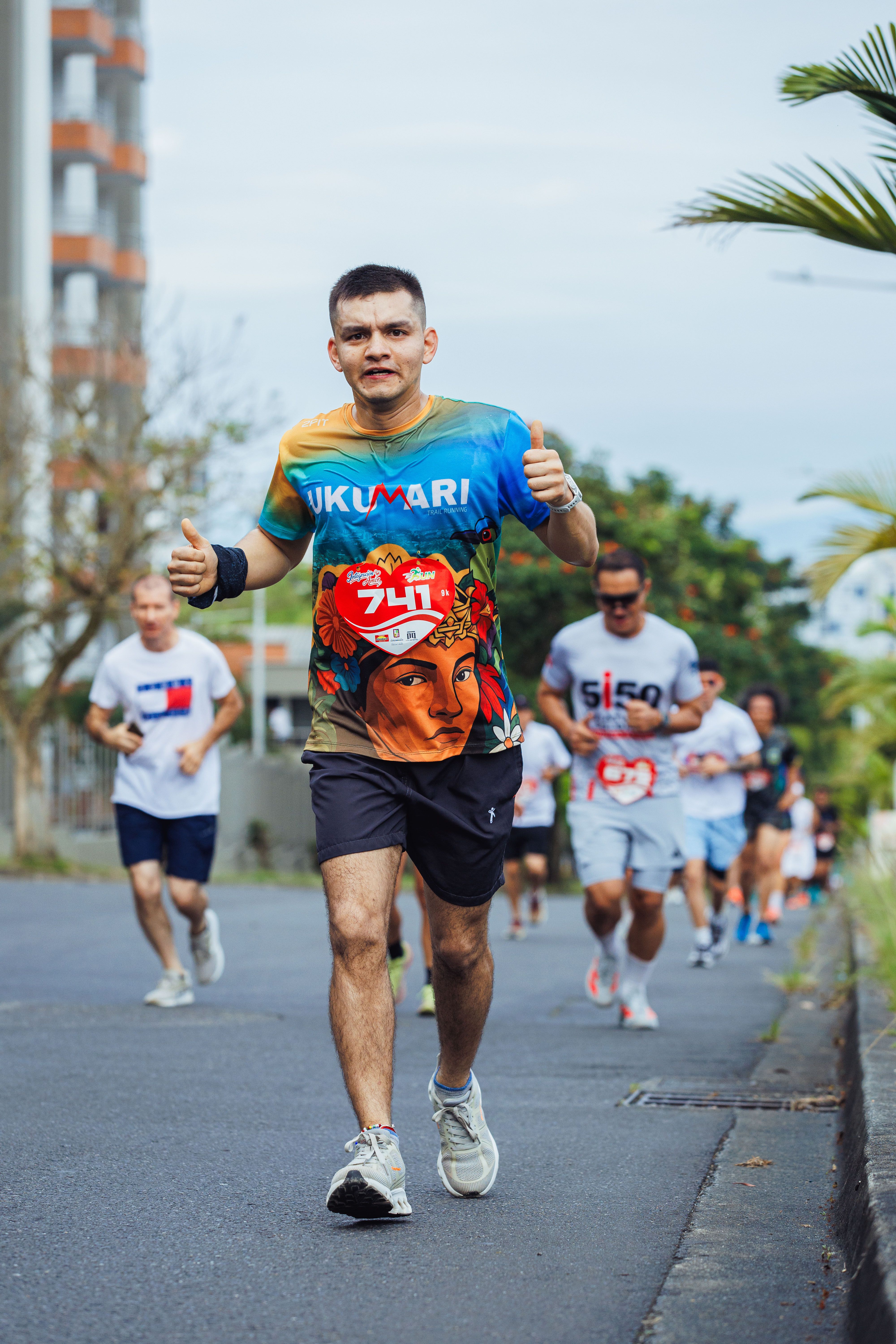 Joggers participate in a vibrant running event, showcasing colorful athletic gear.