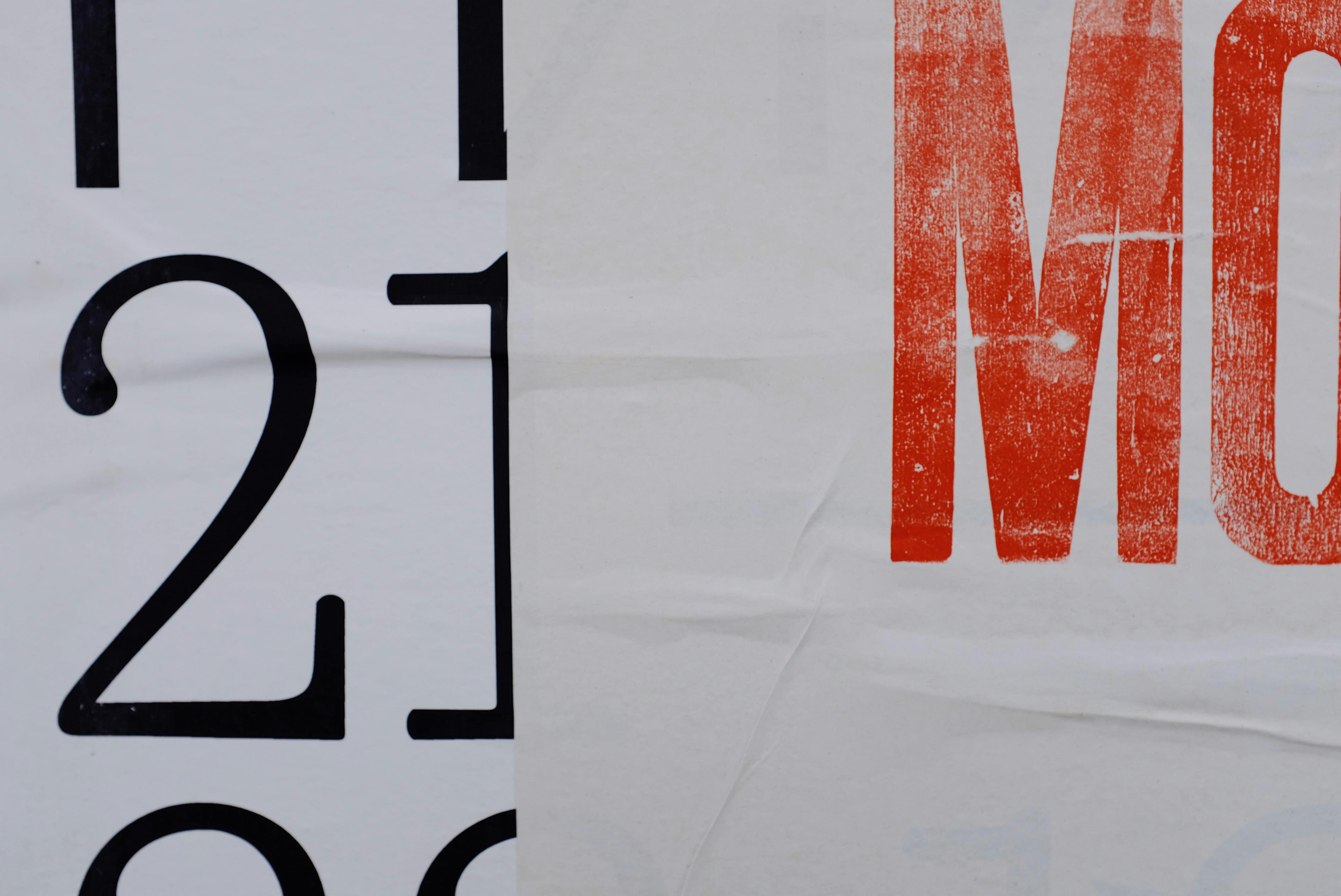 colorful poster with numbers and letters on white surface
