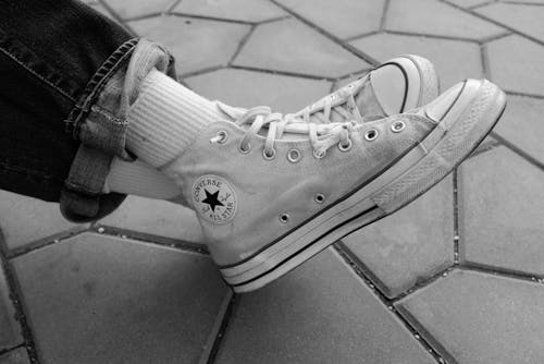 Grayscale Photo of Converse All Star High Top Sneakers