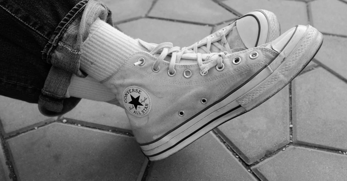 Grayscale Photo of Converse All Star High Top Sneakers · Free Stock Photo