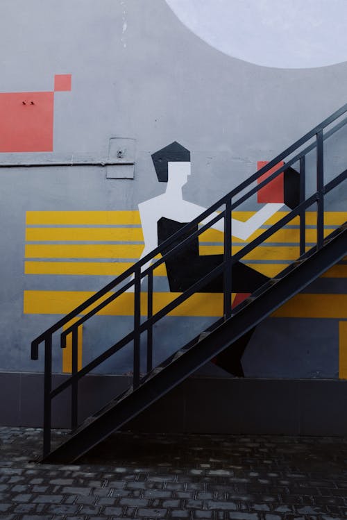 Free Black Staircase Beside Mural Wall Stock Photo
