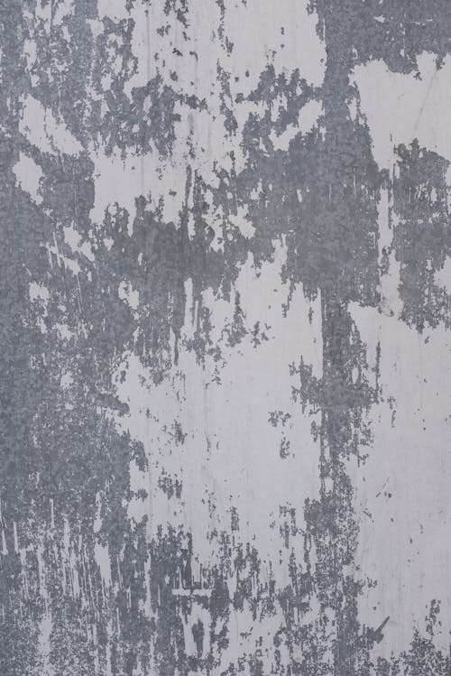 Free Shabby concrete wall fragment texture with scratches and cracks Stock Photo