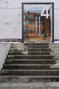 Modern building with stairs and glass door