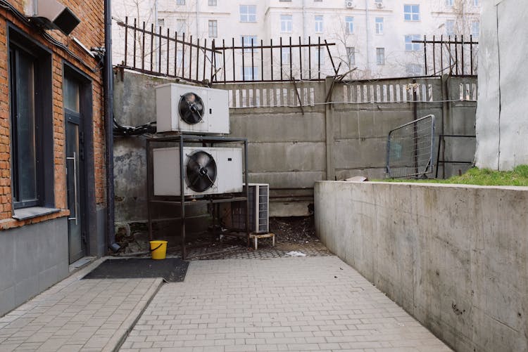 Air Conditioning System On Street In Yard