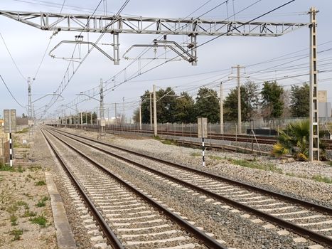 Scenic view of high-speed railway tracks in La Rinconada, Andalucía, Spain.