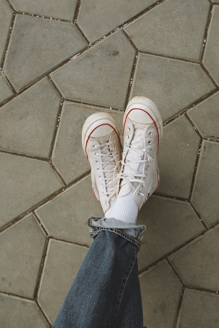 Person In Blue Denim Jeans And White  Converse Sneakers