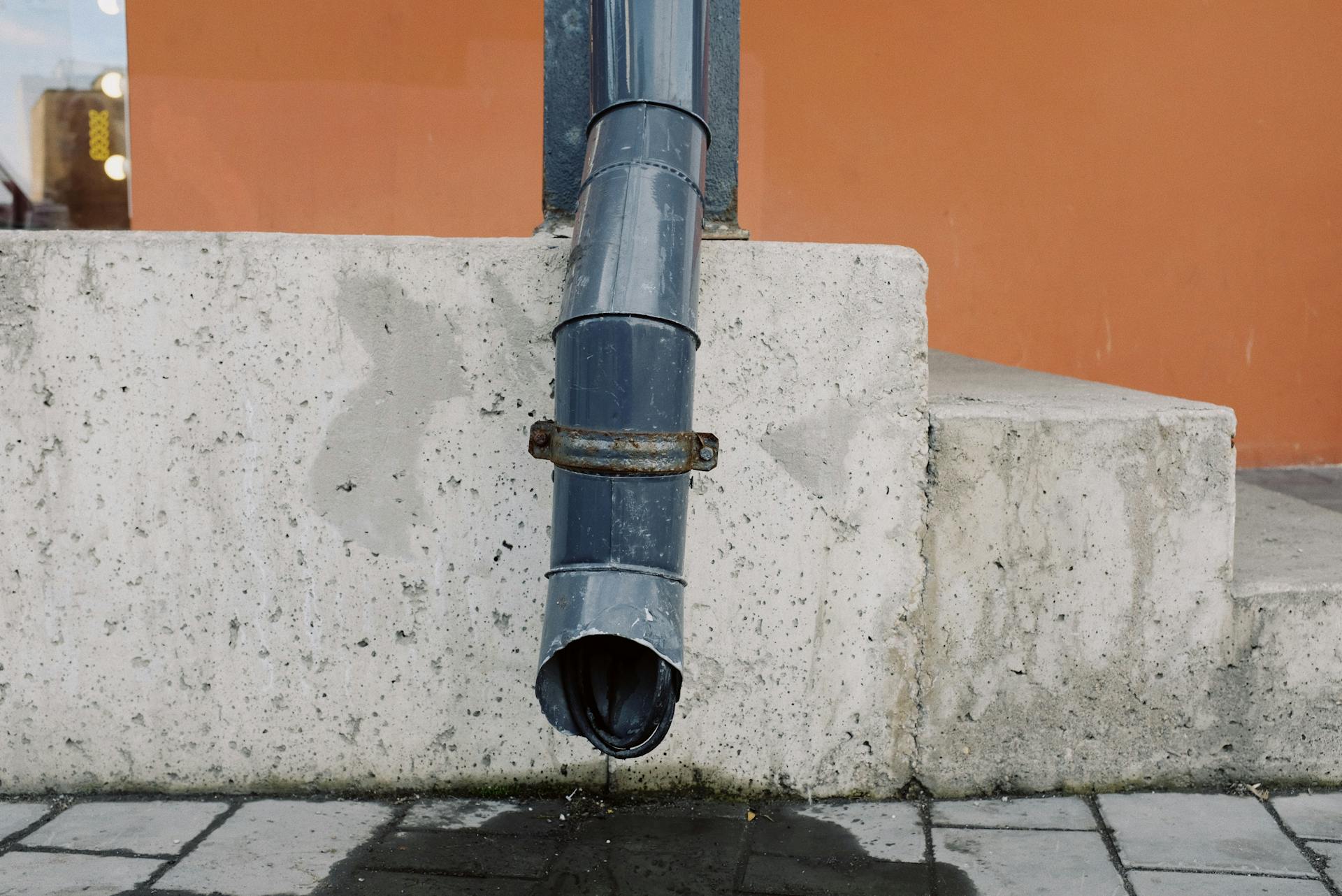 Water Dripping from Drain Spout