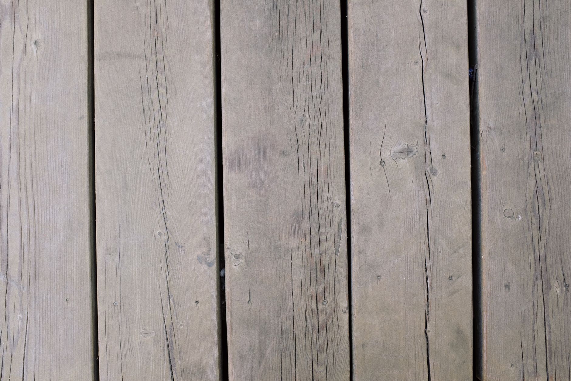 Close-up of capped composite decking boards resistant to mold and rot in humidity