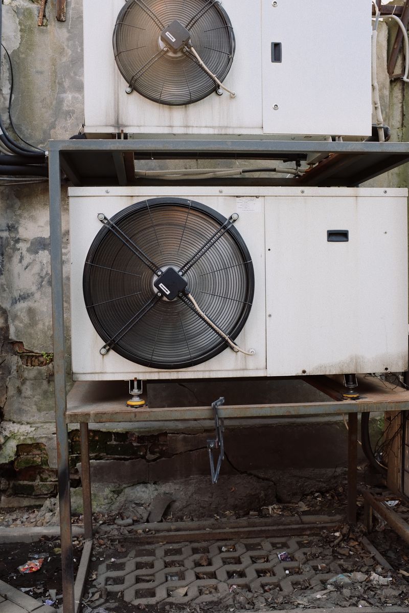 Compressors in white casings running on full power installed outside of building
