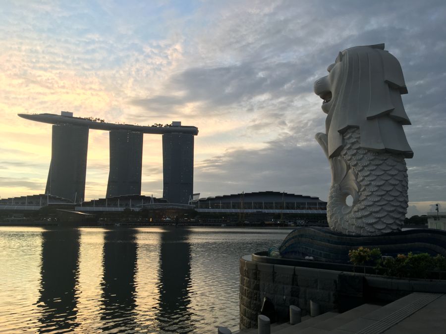 The Merlion and Marina Bay Sands in Singapore at sunrise