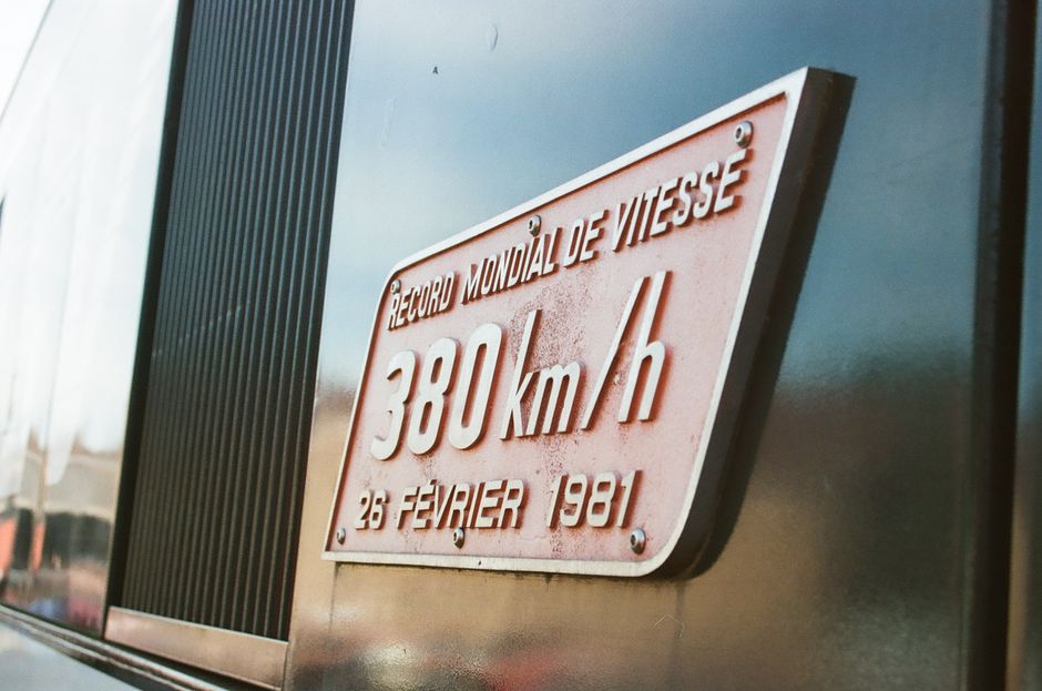 Close-up of a TGV speed record plaque from 1981, showcasing 380 km/h.