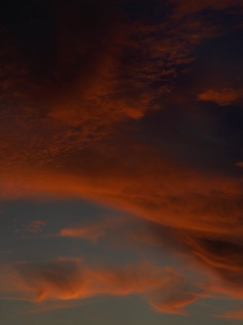 Free Capture the breathtaking hues of a sunset sky over Monopoli, Italy, highlighting rich reds and oranges. Stock Photo
