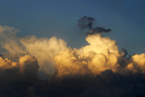 Free Captivating cumulus clouds illuminated by sunset over Paraná, Brazil. Stock Photo