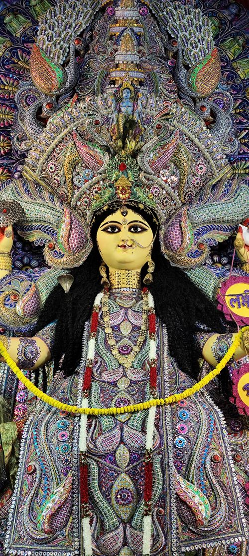 Free Exquisite Hindu Goddess Durga idol adorned with vibrant ornamental details. Stock Photo